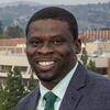 a headshot of Olufunsho Ayo smiling. 